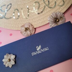 Swarovski rose gold-plated strandage necklace adorned Globe clear crystals